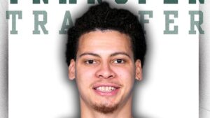 Twarz mężczyzny na tle napisu transfer